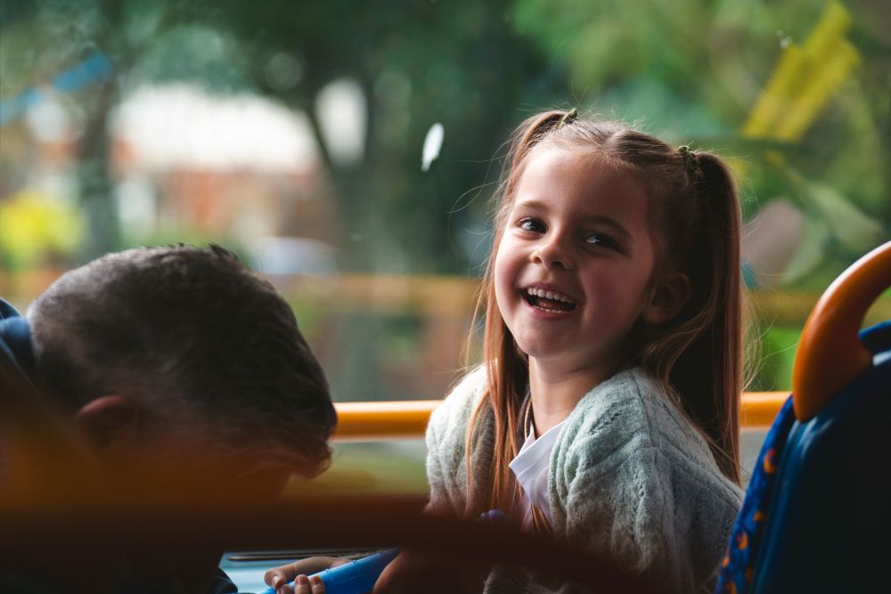 A child on a bus